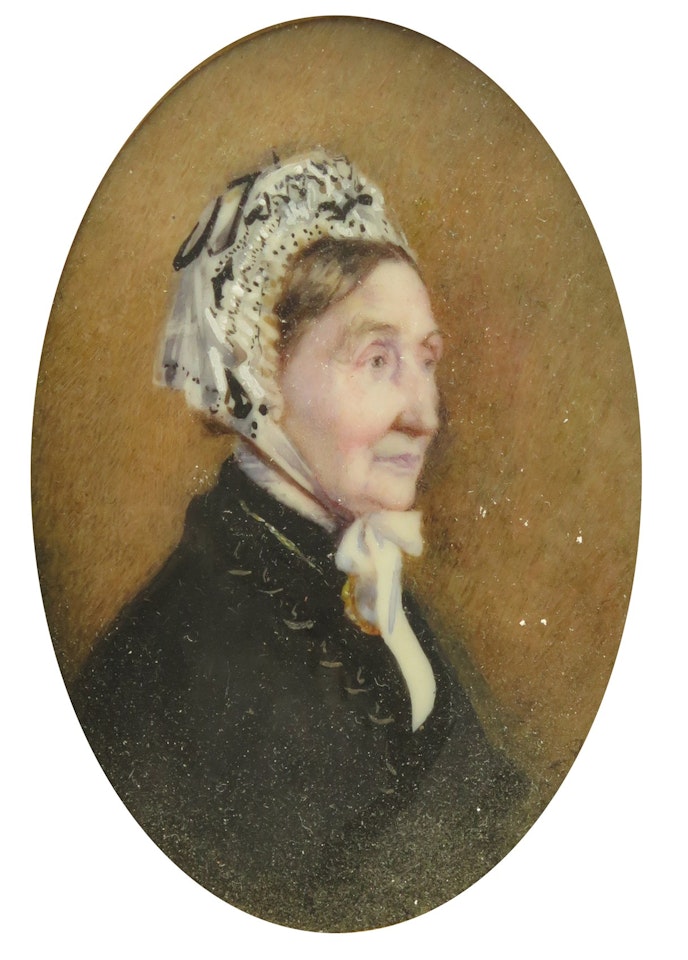 Portrait miniature of a lady, head and shoulders, wearing black and a white lace bonnet by English School
