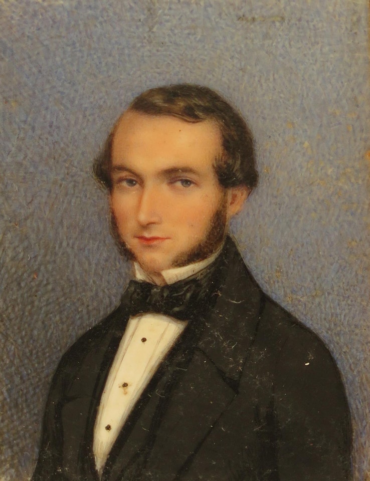 Portrait miniature of a gentleman, head and shoulders, in a black jacket and bow tie by English School
