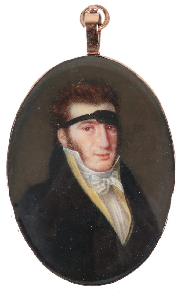 Portrait miniature of a gentleman, wearing a black coat, yellow waistcoat and a support on his forehead by French School