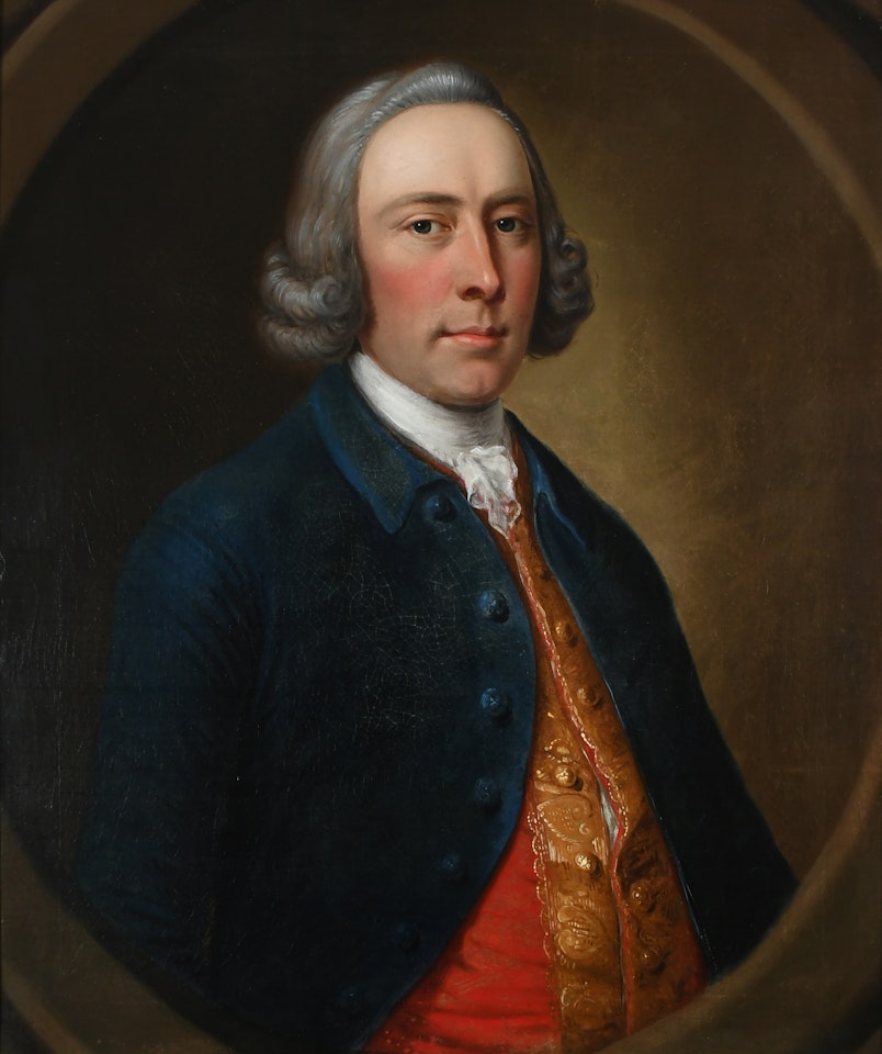 Portrait of a gentleman, bust-length, wearing a blue coat and red brocaded waistcoat, in a painted oval by English School