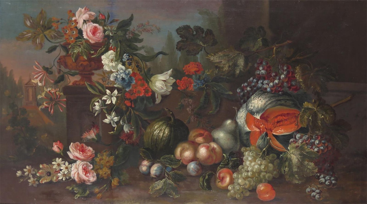 Still life of flowers and fruit on a ledge in a landscape by French School