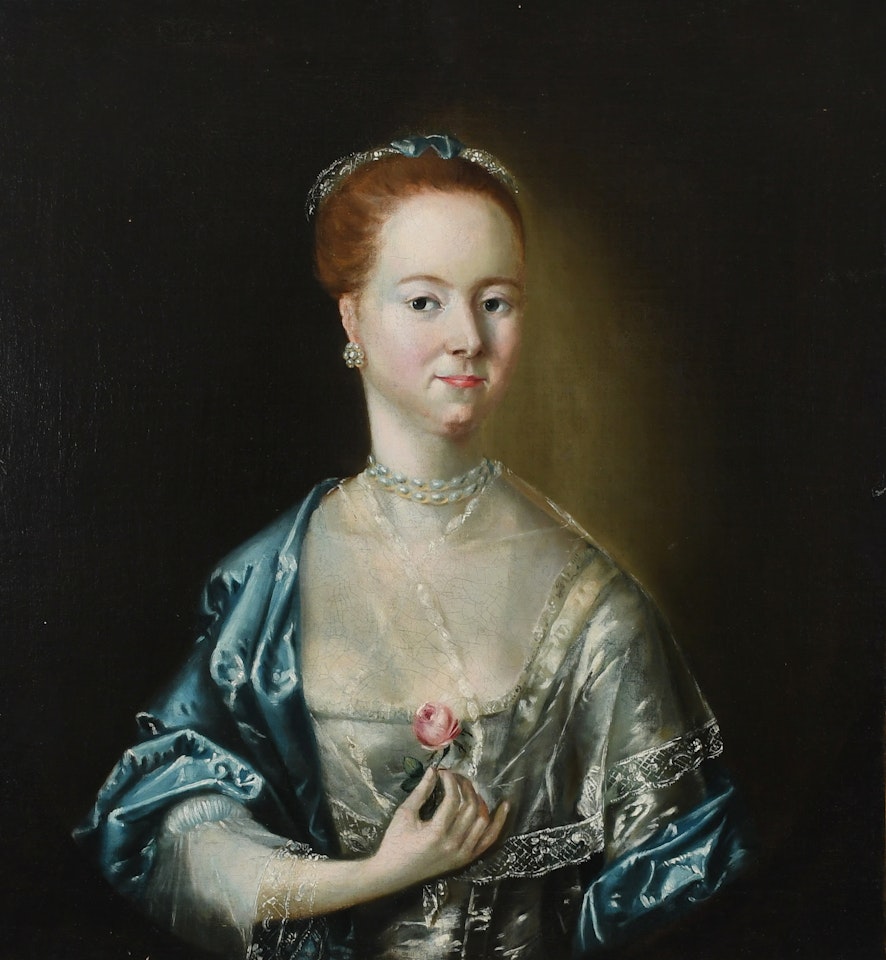 Portrait of a lady, half-length, wearing a blue and grey silk dress, pearl necklace and holding a rose by English School