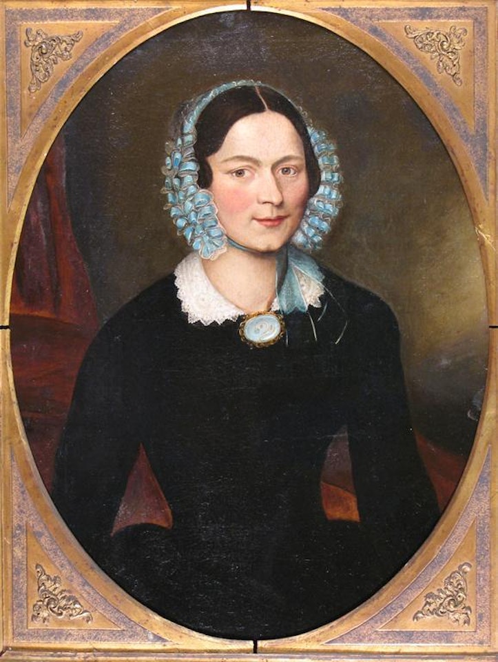 Portrait of a lady wearing a blue ribbon and lace cap by English School