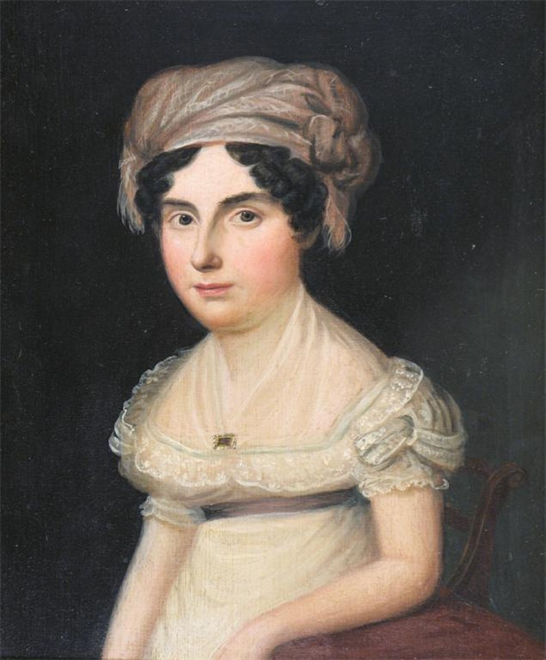 Portrait of a lady, half length seated by French School