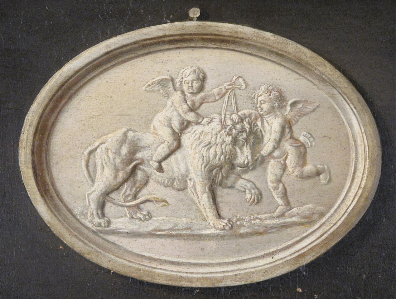 Putti with a lion by Continental School