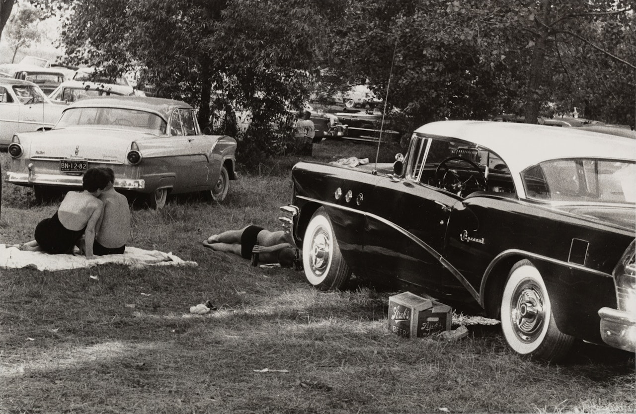 Picnic In A Car Park, Fourth Of July, 1955 by Robert Frank