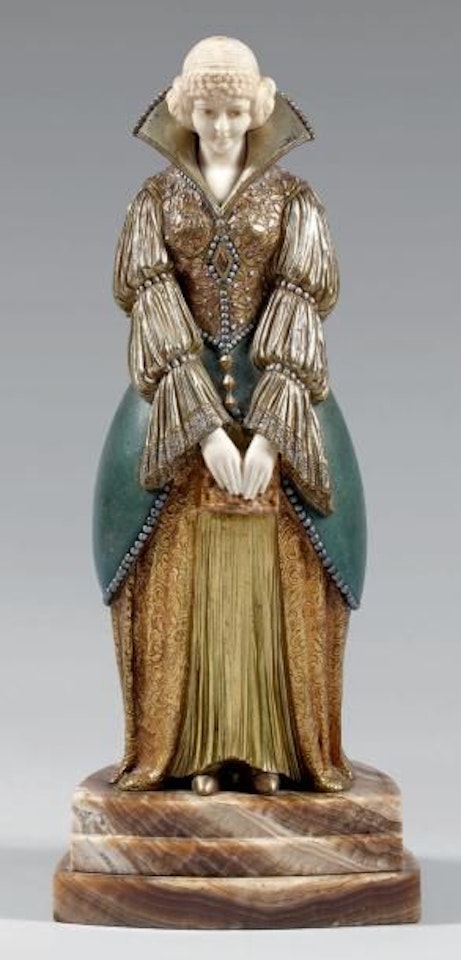 Young woman with a Chryselephantine book by Demetre Chiparus