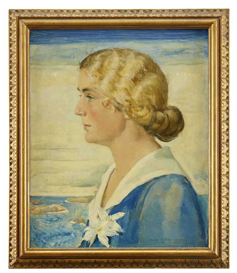 Portrait of woman in blue by Olle Hjortzberg