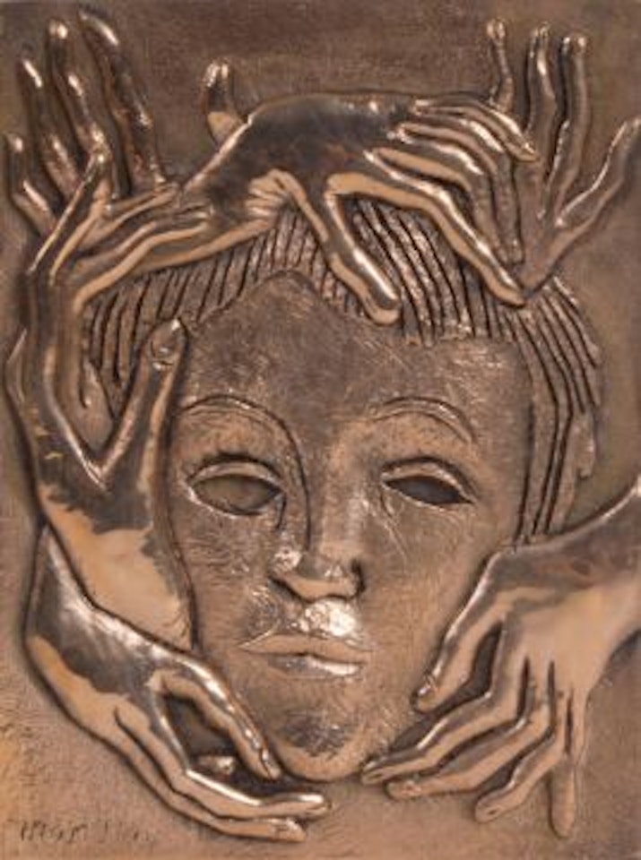 Mask bronze relief by Man Ray