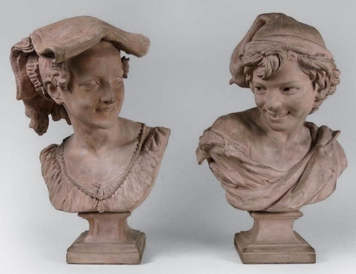 The Neapolitan laugher and the Neapolitan laugher by Jean-Baptiste Carpeaux