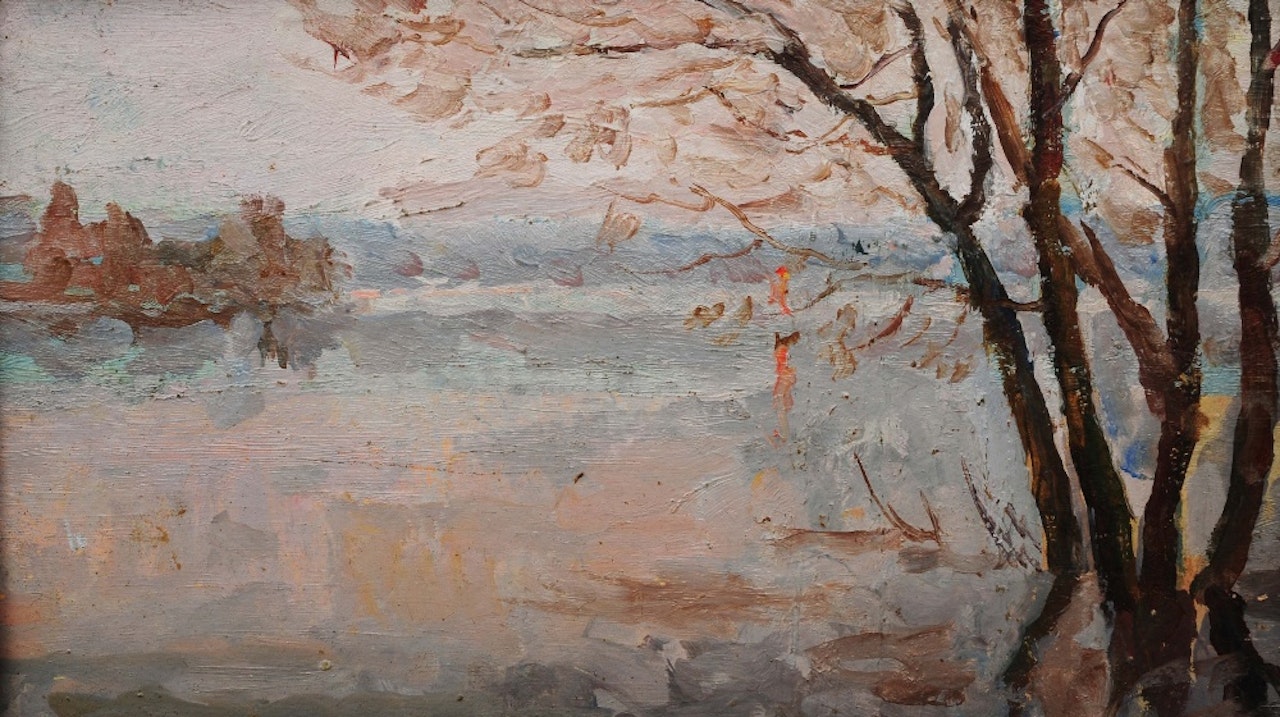 A river landscape at sunset by Russian School
