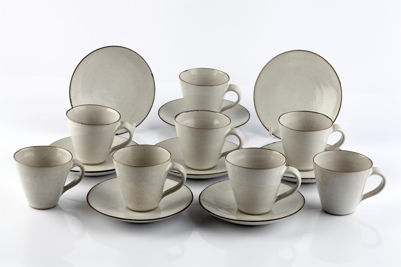 Set of eight cups and saucers by Lucie Rie