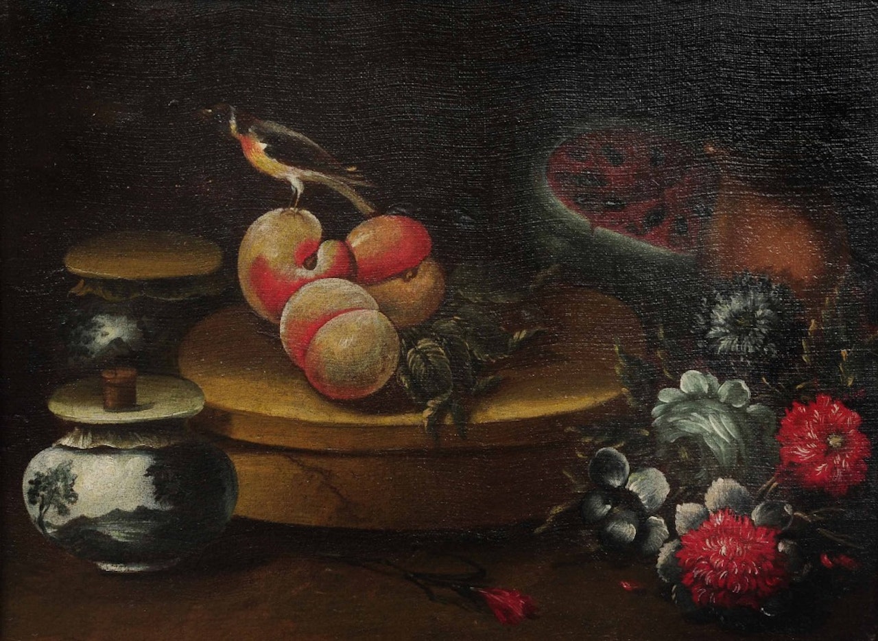 A chaffinch perched upon peaches, on a stand surrounded by fruit, flowers and vases by Spanish School