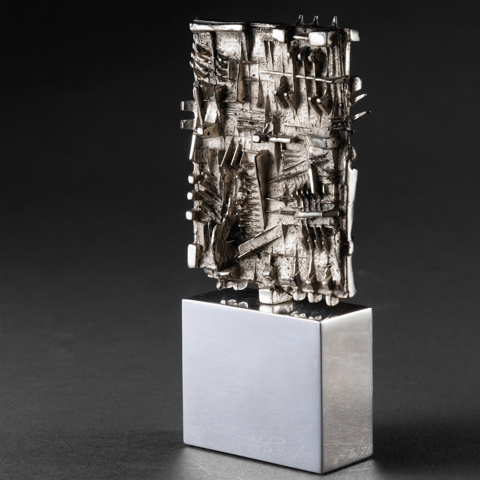 Stele by Arnaldo Pomodoro