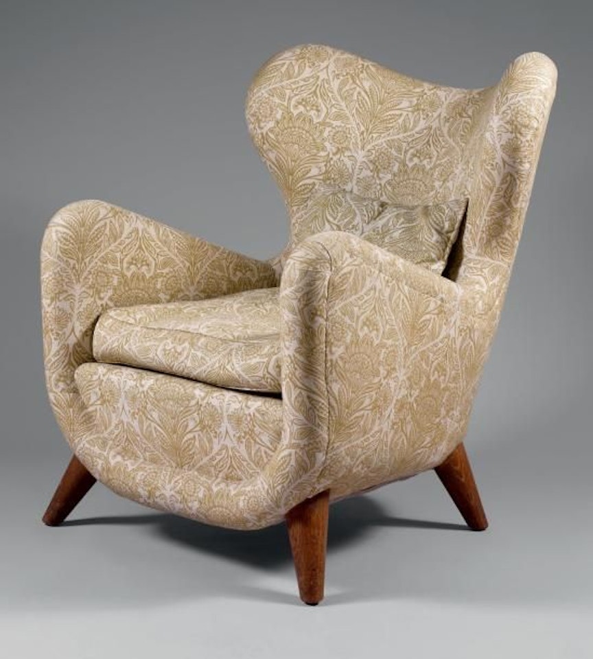 Low winged armchair, “Éléphanteau” model by Jean Royere
