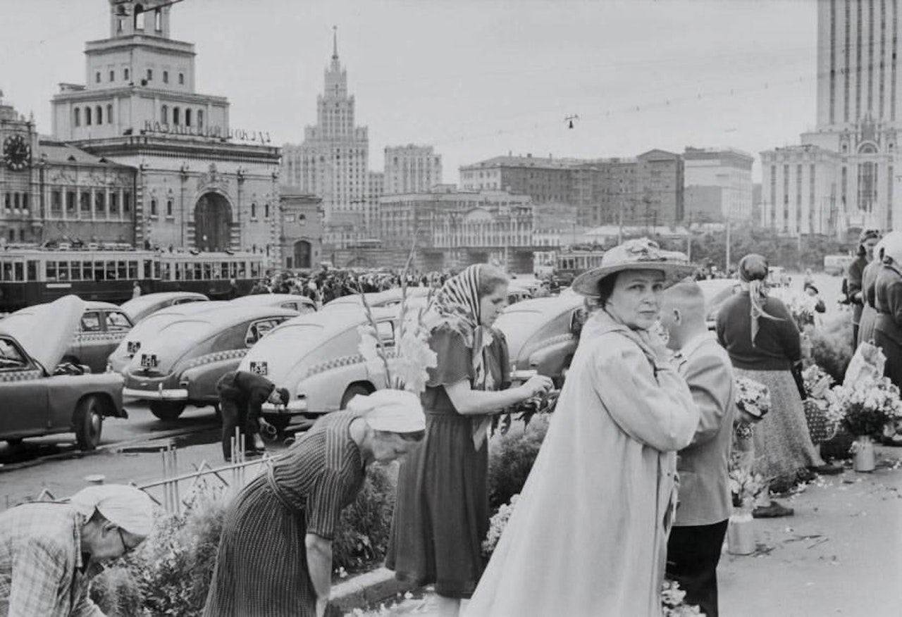Women selling flowers from their garden, Komsomol Square, Moscow, Russia by Henri Cartier-Bresson