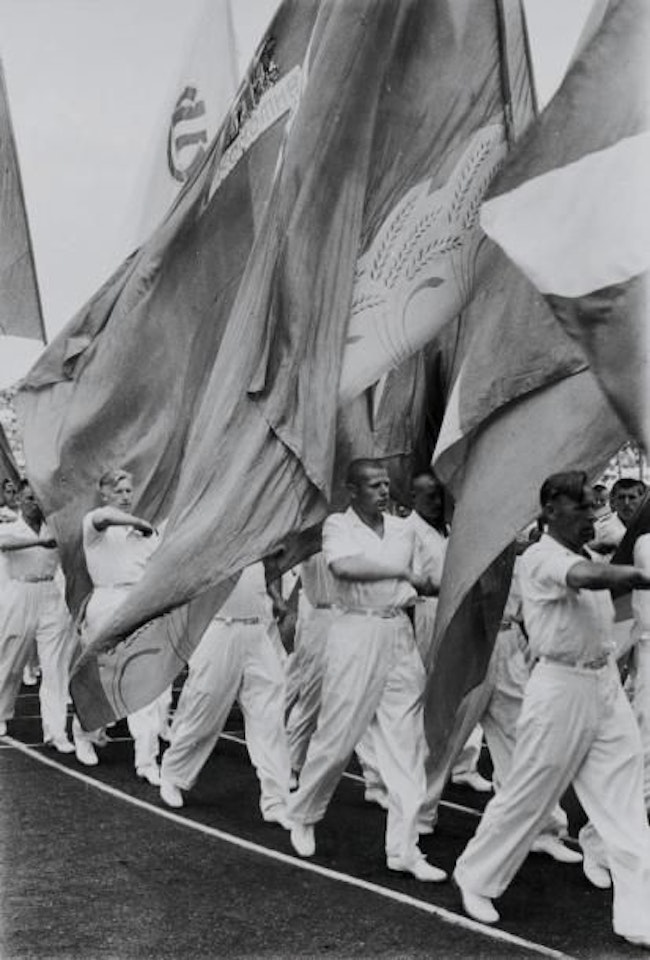 Parade of sports societies during the sports festival, Dynamo stadium, Moscow, Russia by Henri Cartier-Bresson