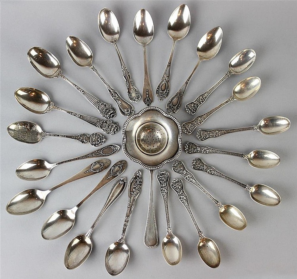 EIGHT TIFFANY AND CO. "OLYMPIAN" SILVER COFFEE SPOONS TOGETHER WITH THIRTEEN VARIOUS SILVER SPOONS AND A STRAINER by Tiffany & Co.