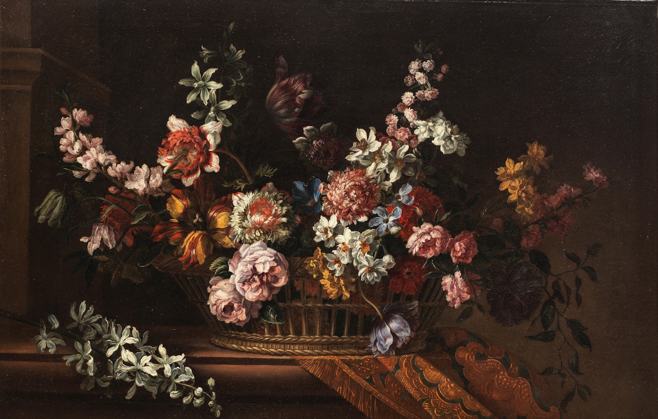 A basket filled with roses, poppies, chrysanthemums and other flowers on a draped stone ledge by Jean Baptiste Monnoyer