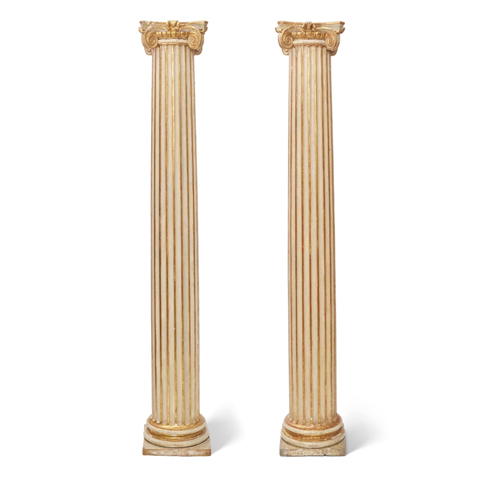 A PAIR OF BAROQUE STYLE CARVED PARCEL GILT AND PAINTED WOOD CORINTHIAN COLUMNS by Unknown (Baroque style)