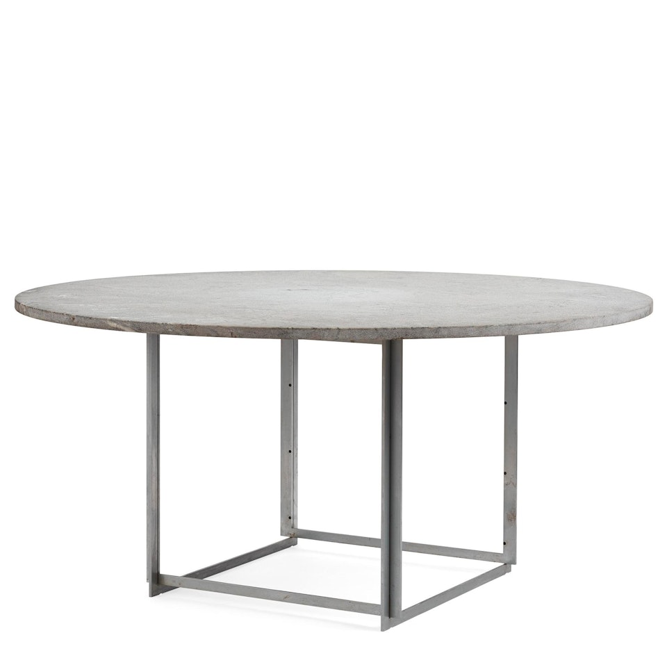 a "PK54" dining table by Poul Kjaerholm