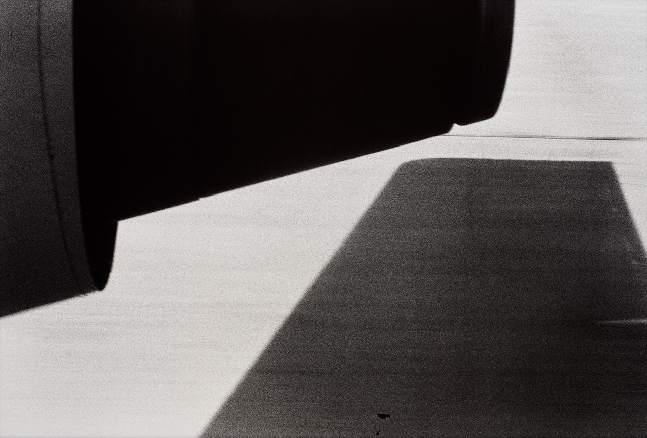 Landing at Orly by Helmut Newton