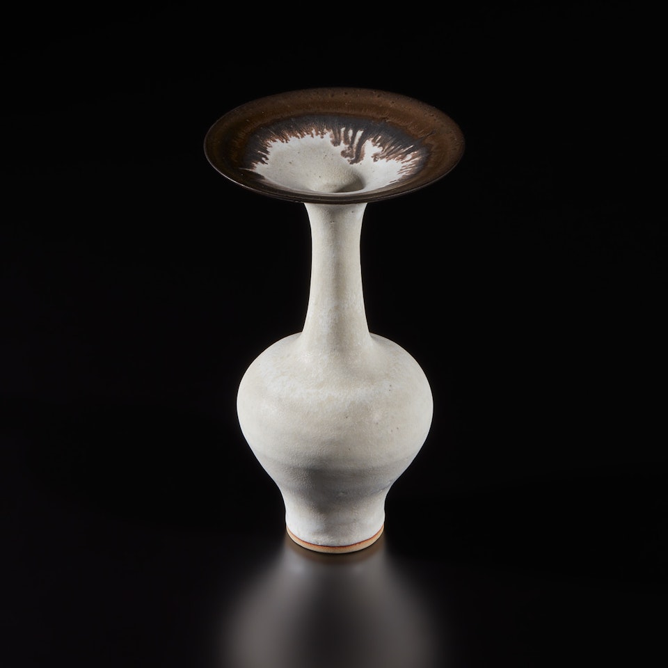 Vase with flaring lip by Lucie Rie