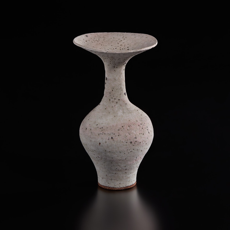 Vase with flaring lip by Lucie Rie