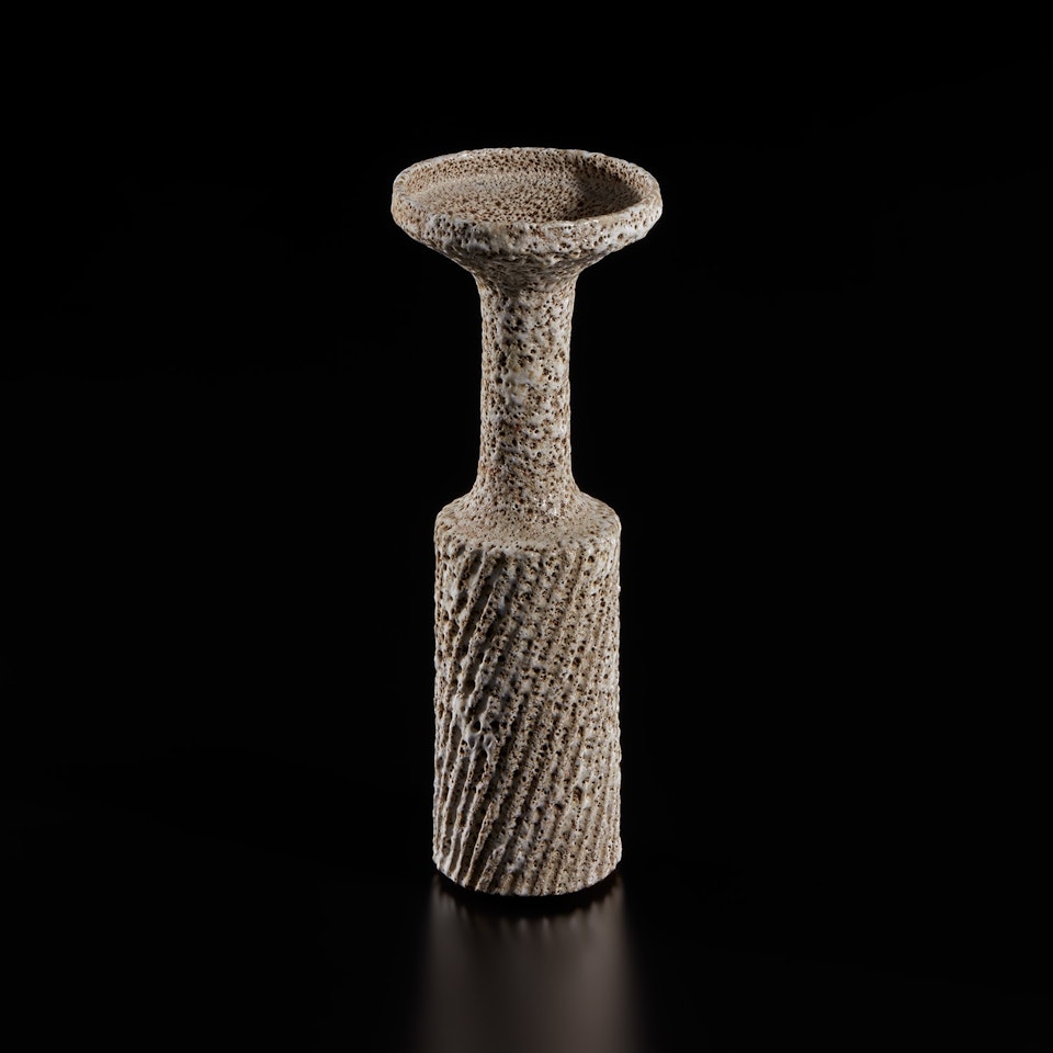 Vase with fluted body and flaring lip by Lucie Rie