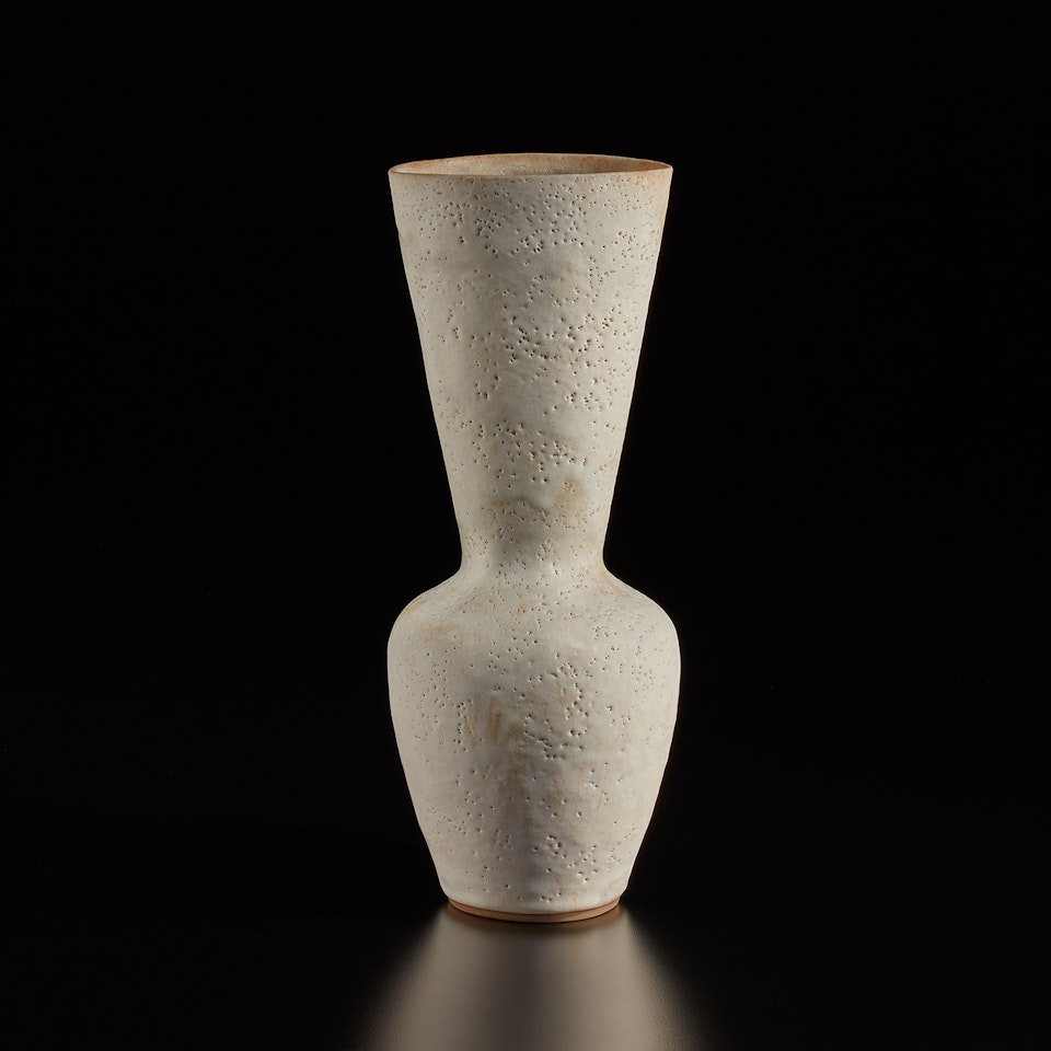 Tall vase with oval lip by Lucie Rie