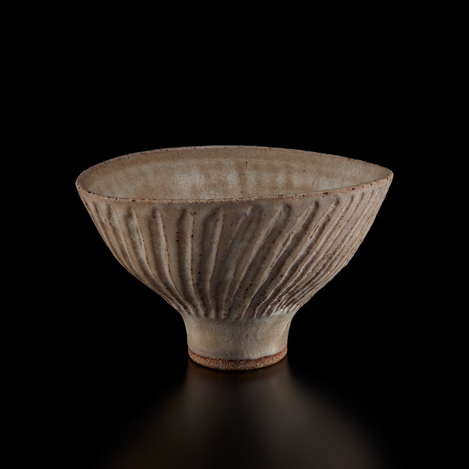 Large oval footed bowl with fluted design by Lucie Rie