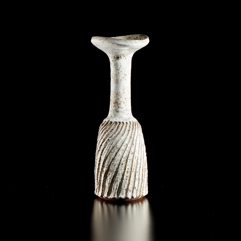 Vase with fluted body and flaring lip by Lucie Rie