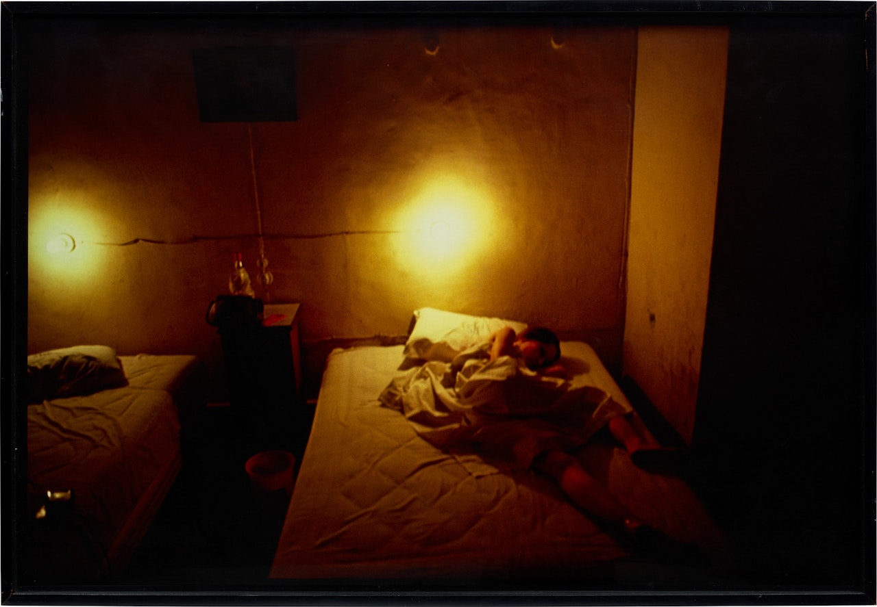 Suzanne in yellow hotel room, Hotel Seville, Merida, Mexico by Nan Goldin