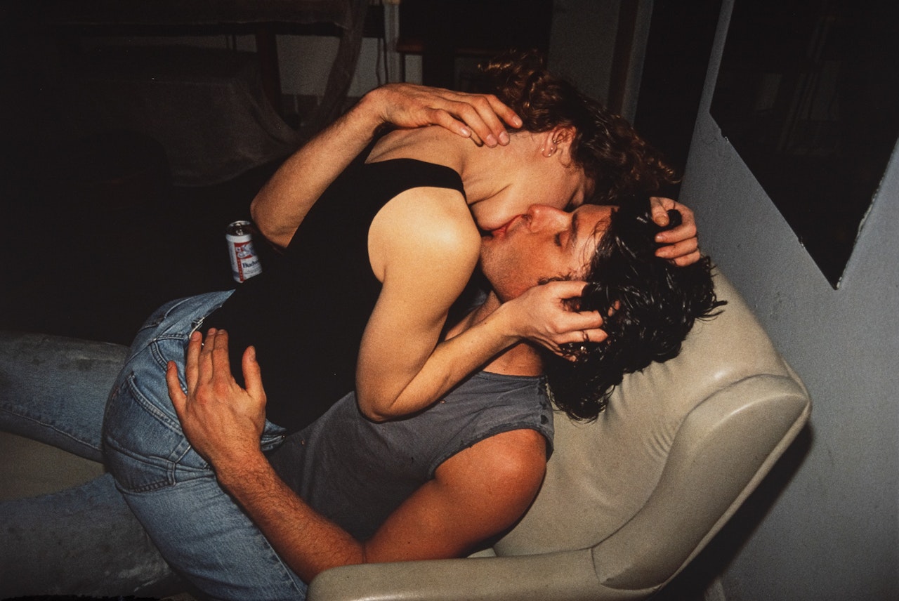Rise and Monty Kissing, NYC by Nan Goldin