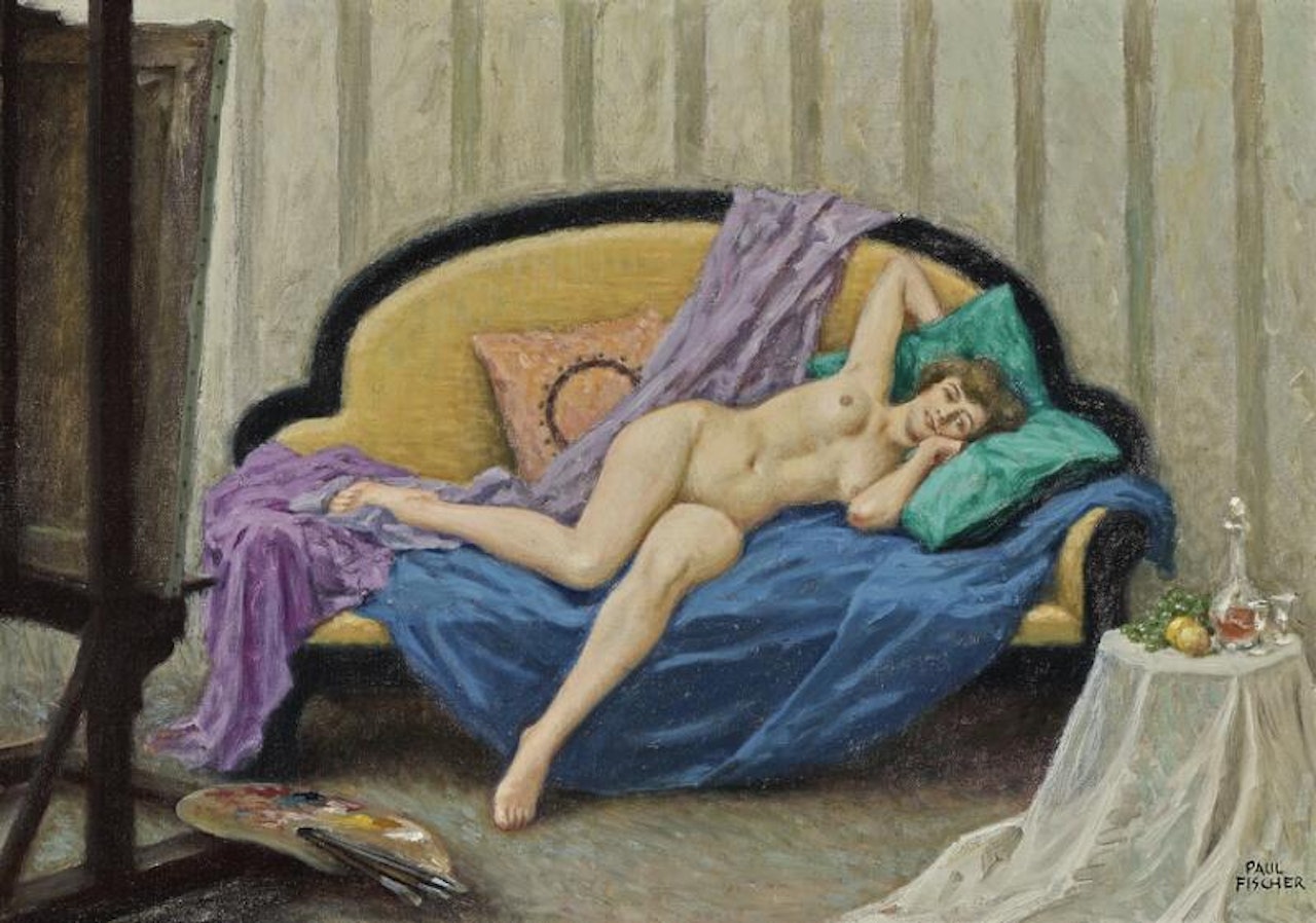 Interior from the artist"s studio. The model is resting on the sofa by Paul Fischer