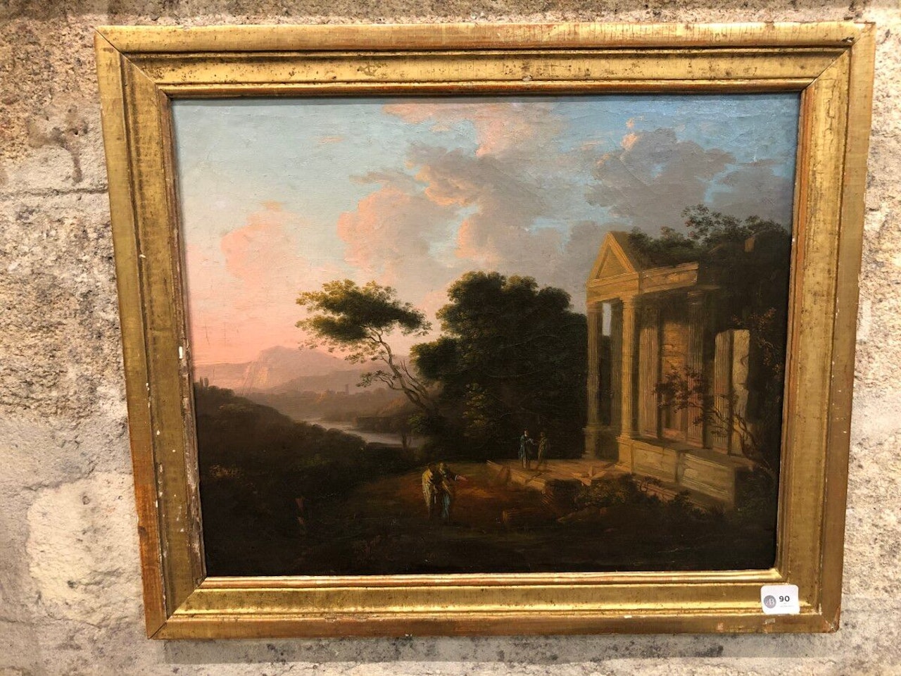 Landscape with ruins of a temple and ancient figures by French School