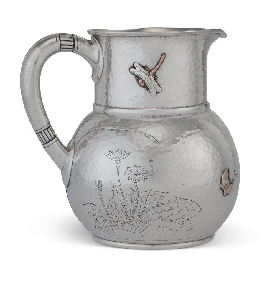 AN AMERICAN SILVER AND MIXED-METAL WATER PITCHER by Tiffany & Co.