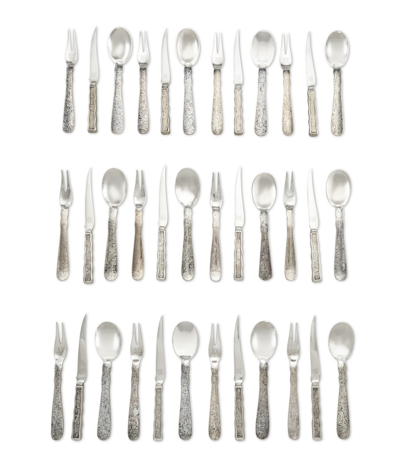 A RARE AMERICAN SILVER AND MIXED-METAL DESSERT FLATWARE SERVICE by Tiffany & Co.