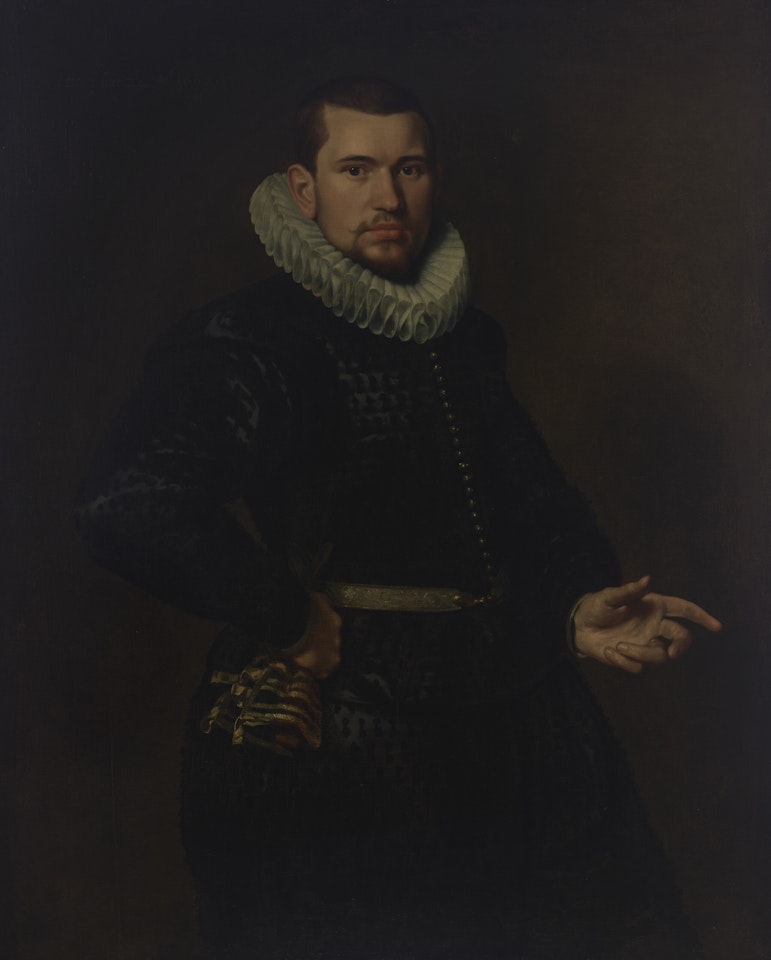 Portrait of a gentleman, in a pinked black silk doublet and hose by Paulus Moreelse