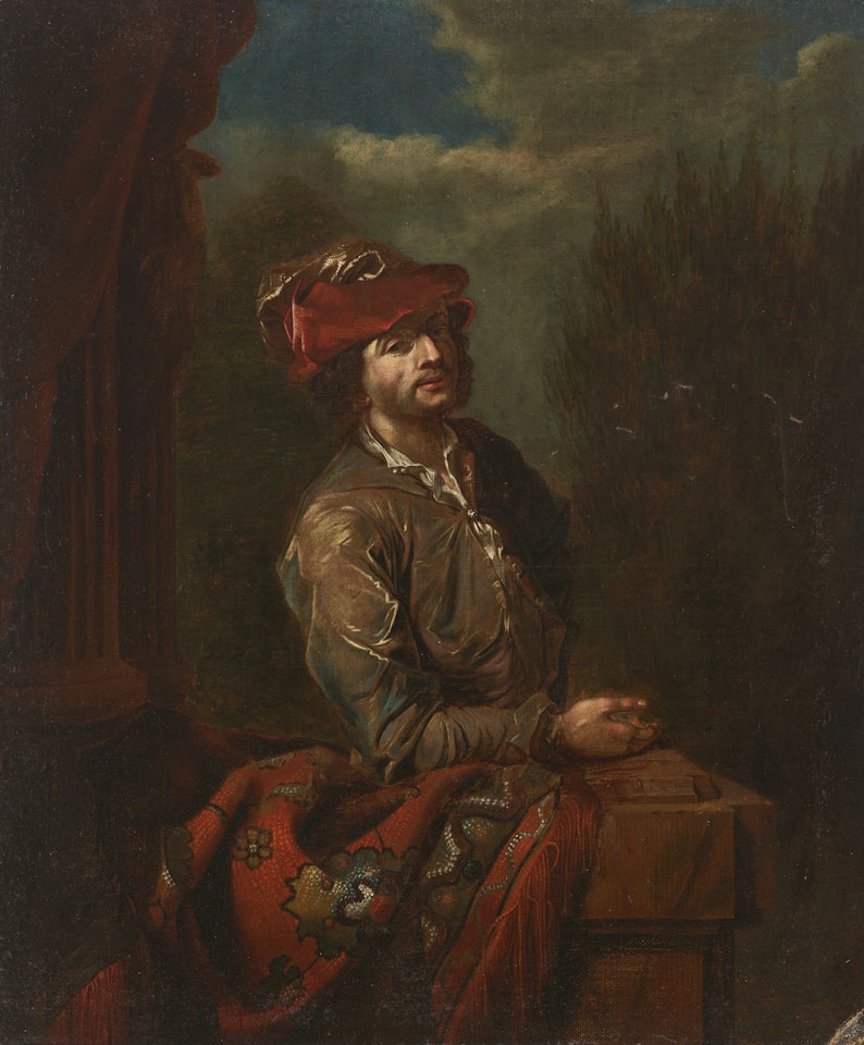 A young man standing at a balustrade draped with a carpet by Dutch School