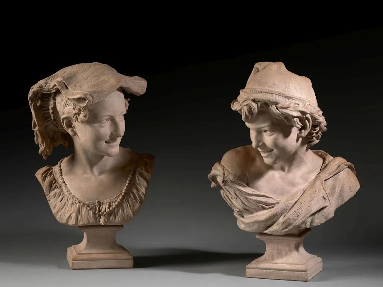Paire de bustes en terre cuite by Jean-Baptiste Carpeaux