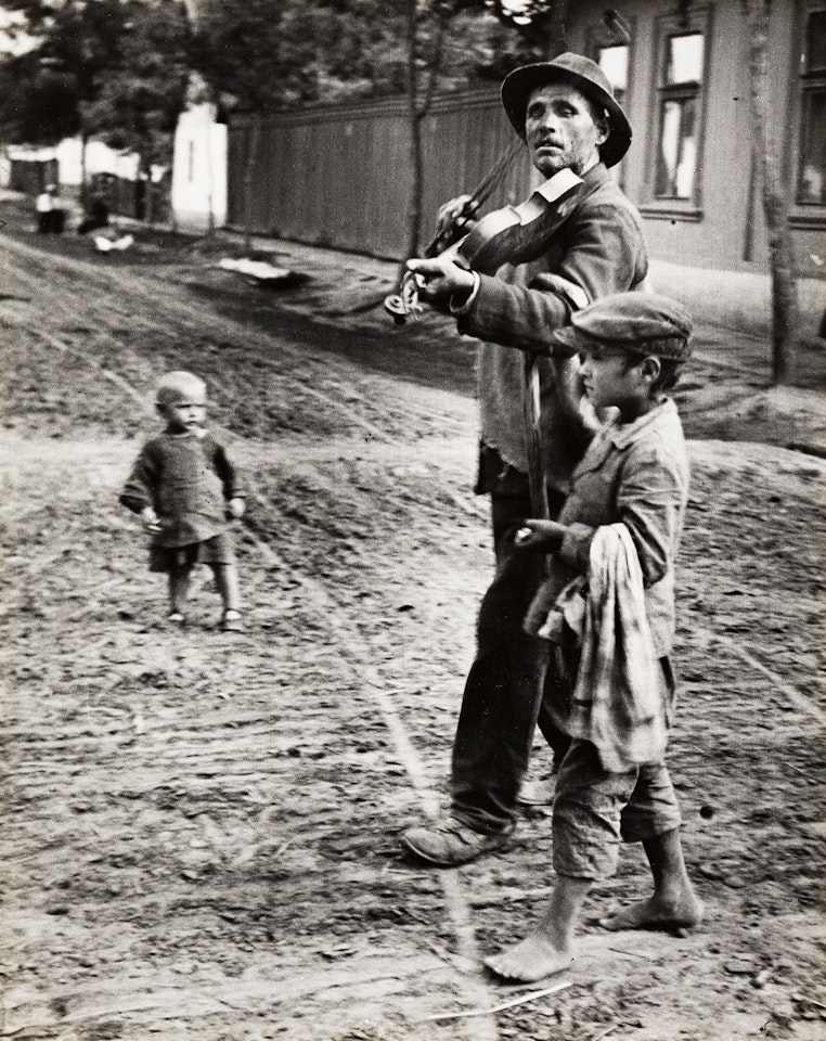Wandering Violinist, Abony, Hungary by André Kertész