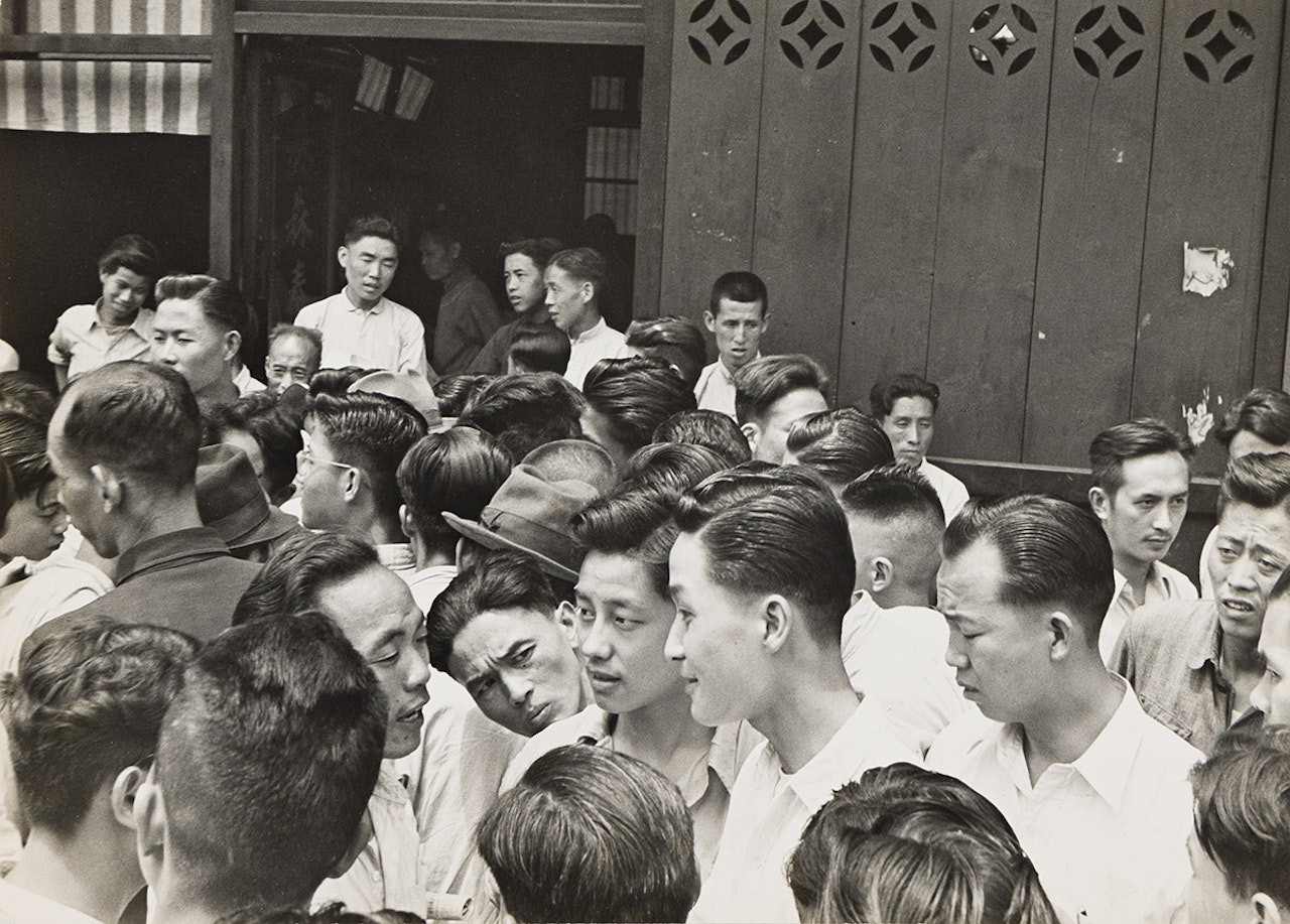 Shanghai, Honan Street, Communist students mingle with the crowd trying to gain friends for the Communist cause by Henri Cartier-Bresson
