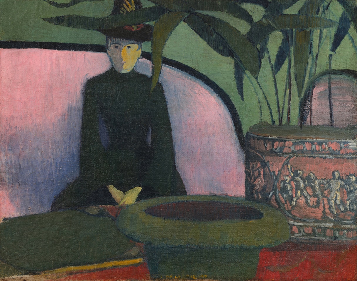 Femme assise sur un canapé rose by Emile Bernard