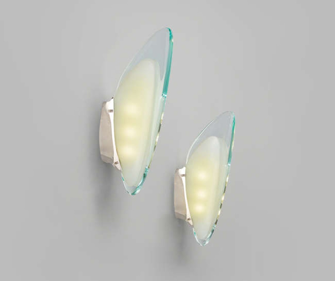 An elegant pair of "Le Cozze" sconces, model no. 1552 by Max Ingrand