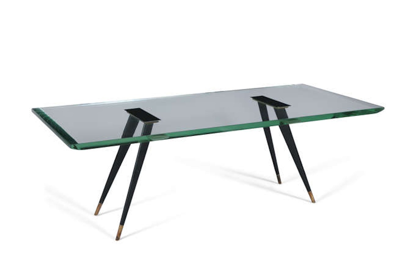 A glass topped coffee table by Max Ingrand
