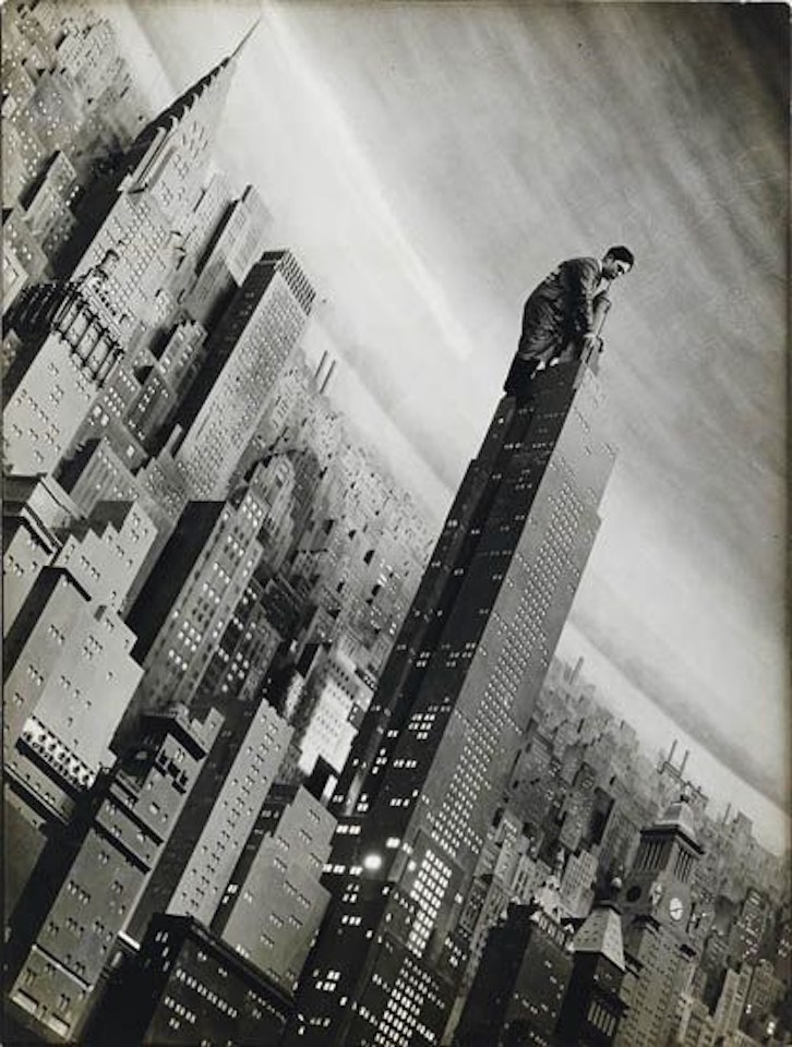 Man working on replica of the Empire State Building at the World's Fair by Margaret Bourke-White