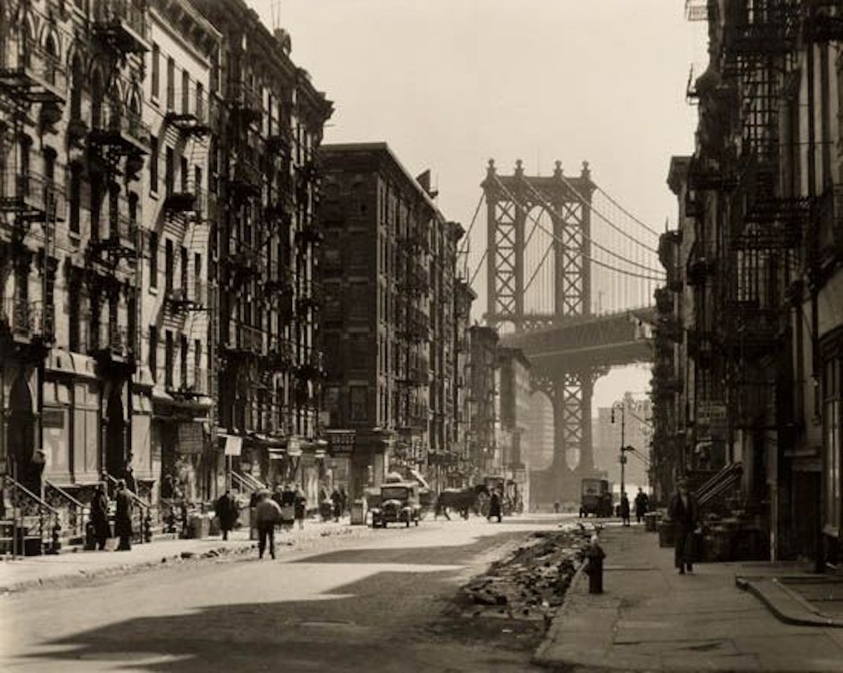 Pike and Henry Streets (street scene with the Manhattan Bridge) by Berenice Abbott