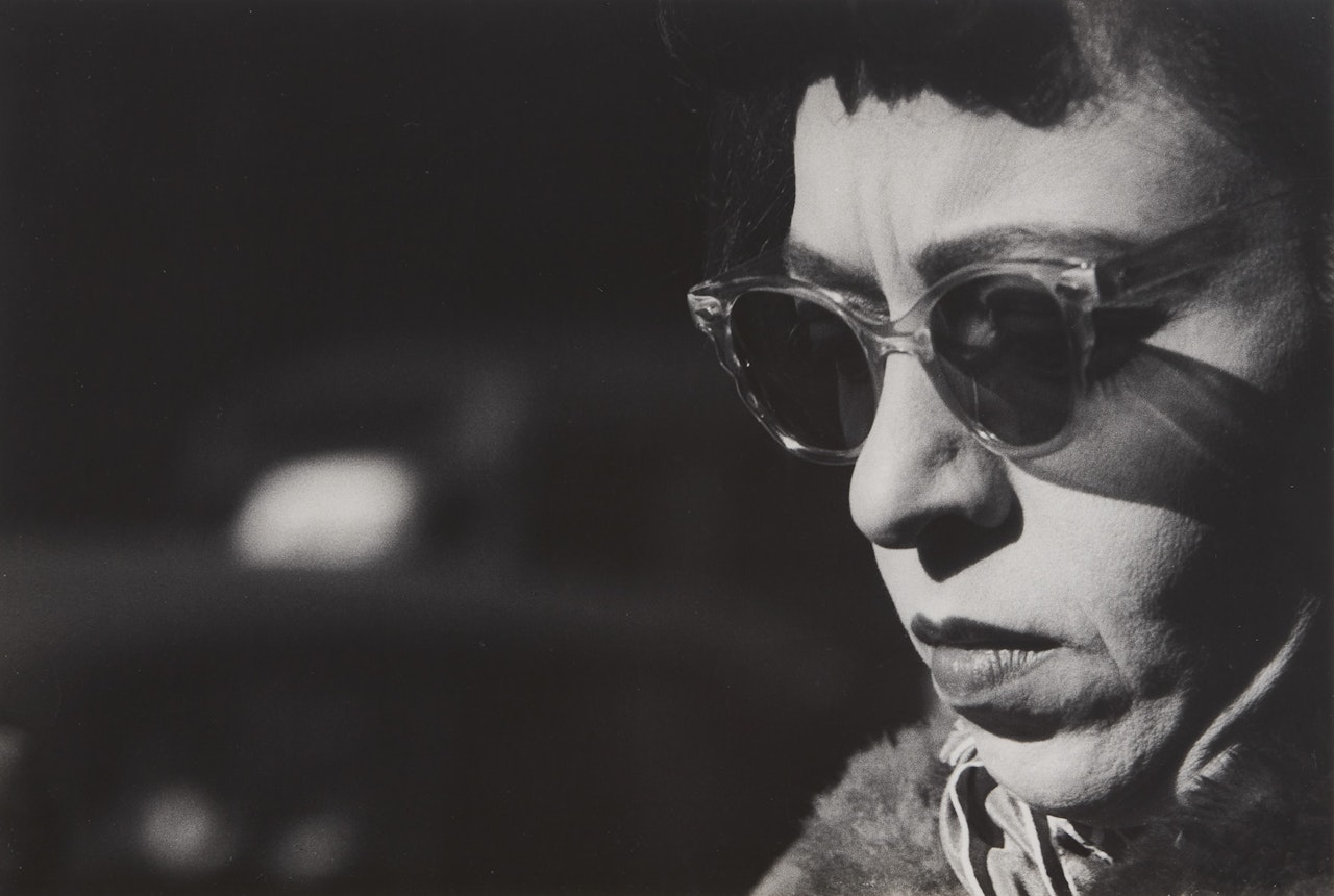 Chicago (woman with sunglasses) by Harry Callahan