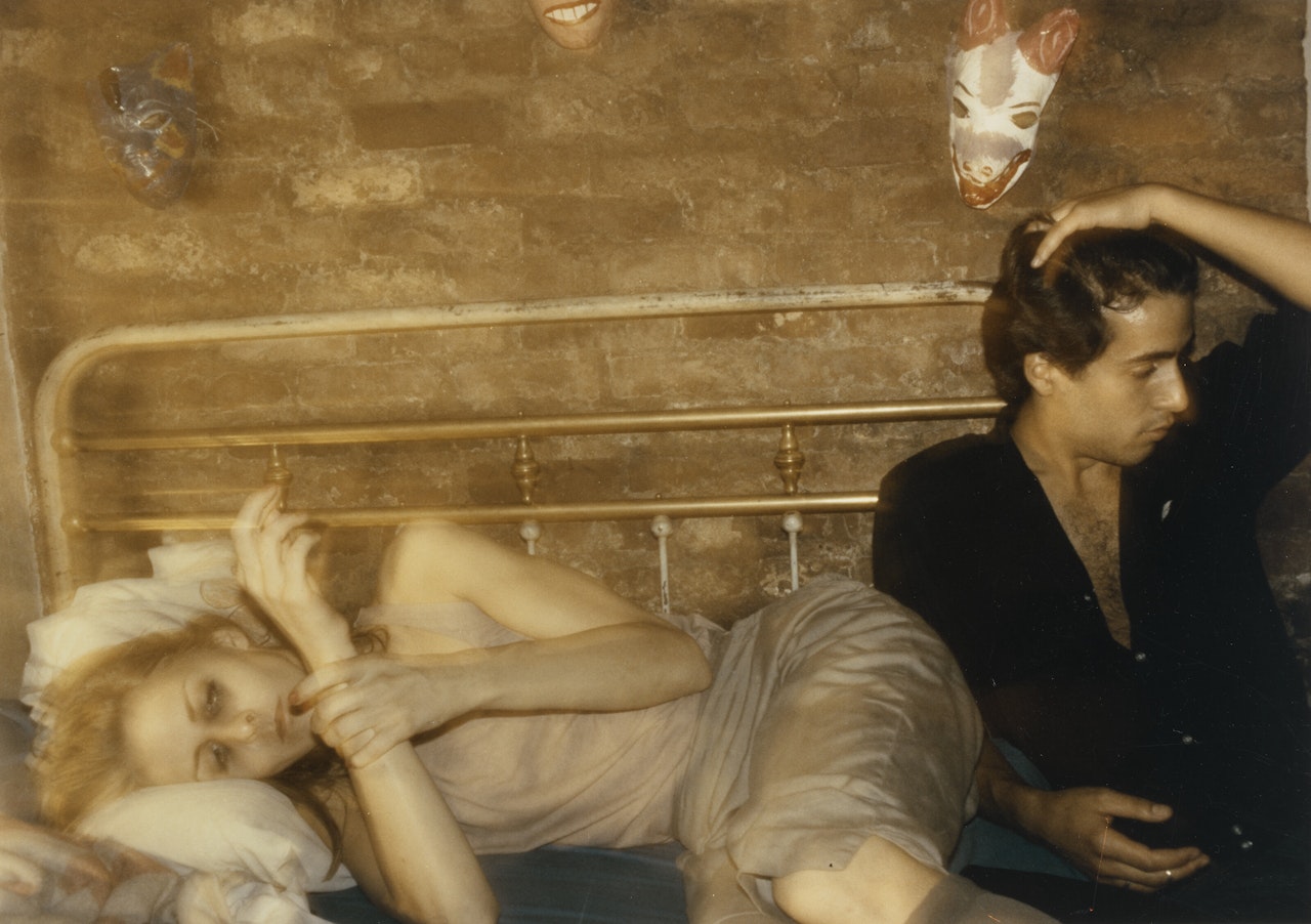 Greer and Robert on the bed, New York City by Nan Goldin